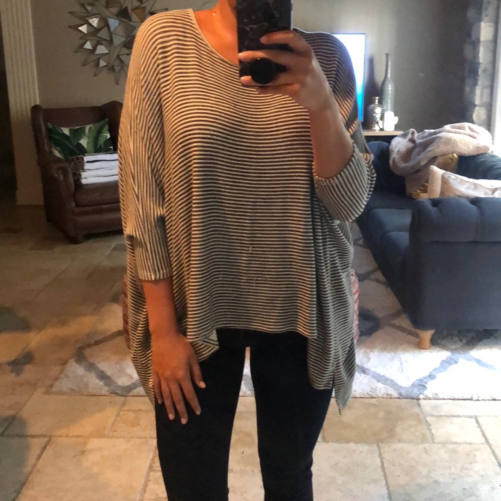 Grey and white striped batwing sweater